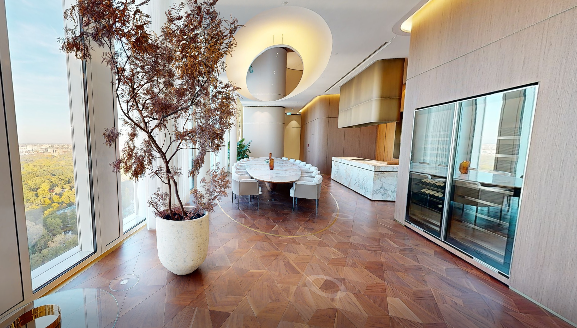 THE EMBER · Long marble table, view onto Berlin skyline